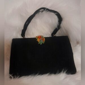 Vintage Women's black shoulder/clutch, metal flower clasp, matching change purse